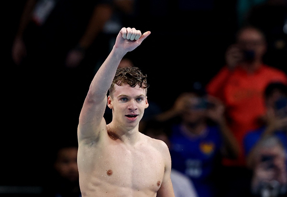 France's Leon Marchand reacts after winning the Olympics men's 200m Breaststroke final and setting an Olympic record at the Paris La Defense Arena, Nanterre, France, on Wednesday.