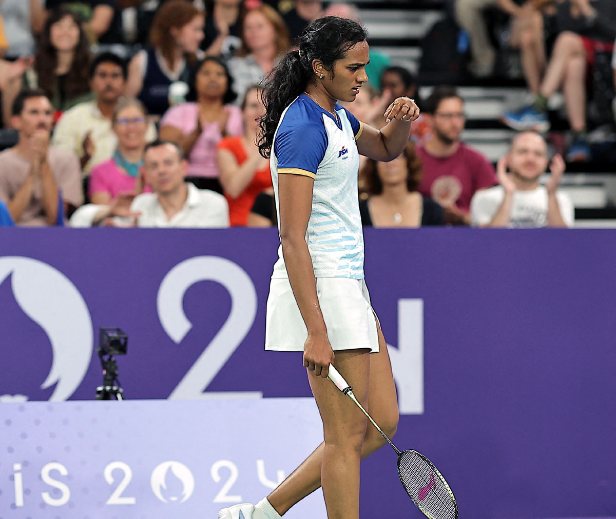 India's PV reacts during her Olympics women's singles Round of 16 match against China's Bing Jiao He at Porte de La Chapelle Arena, Paris, on Thursday. 