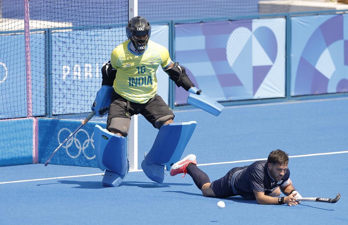 India's goalkeeper PR Sreejesh foils Argentina's Nicolas Della Torre during the Olympics men's Pool B match Yves-du-Manoir stadium, Colombes, France, July 29, 2024.