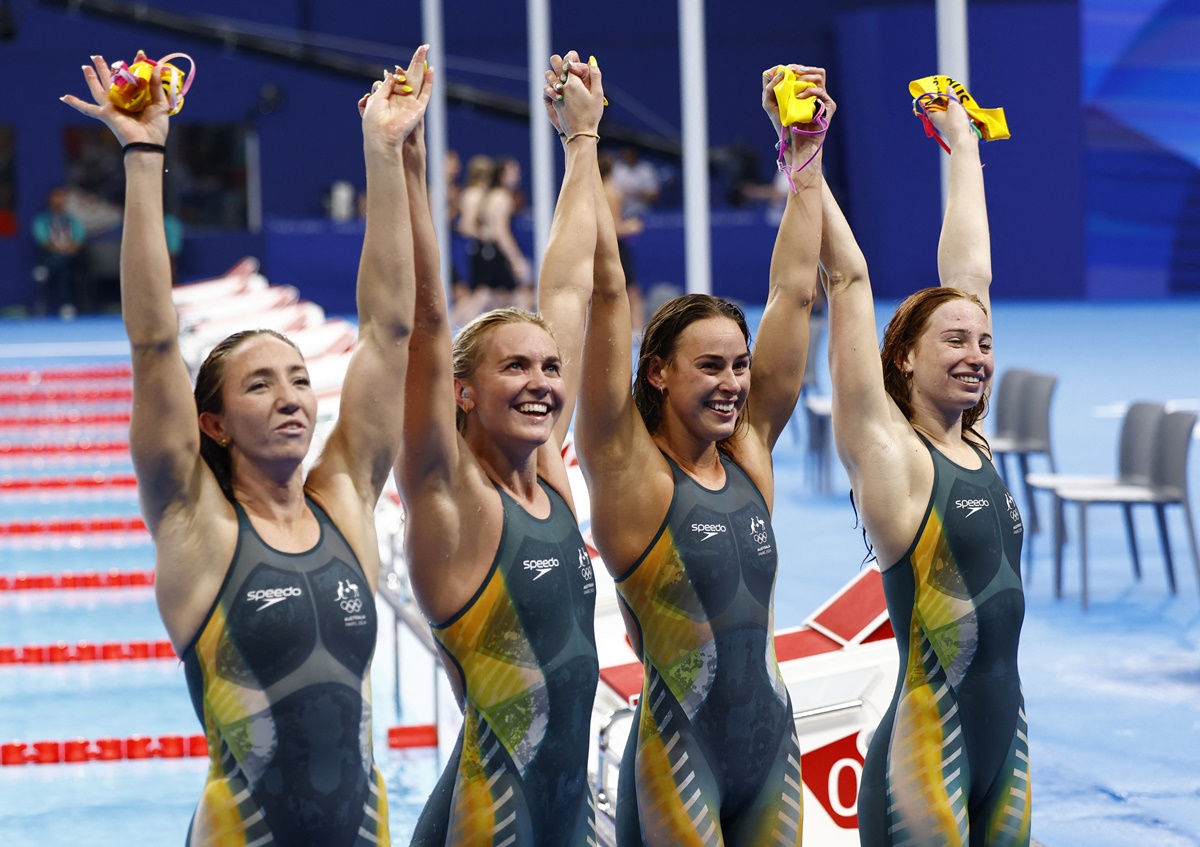 Australia's Mollie O'Callaghan, Lani Pallister, Brianna Throssell and Ariarne Titmus celebrate after winning gold and setting a new Olympic record in the Olympics women's 4x200m Freestyle relay final at Paris La Defense Arena, Nanterre, France, on Thursday.