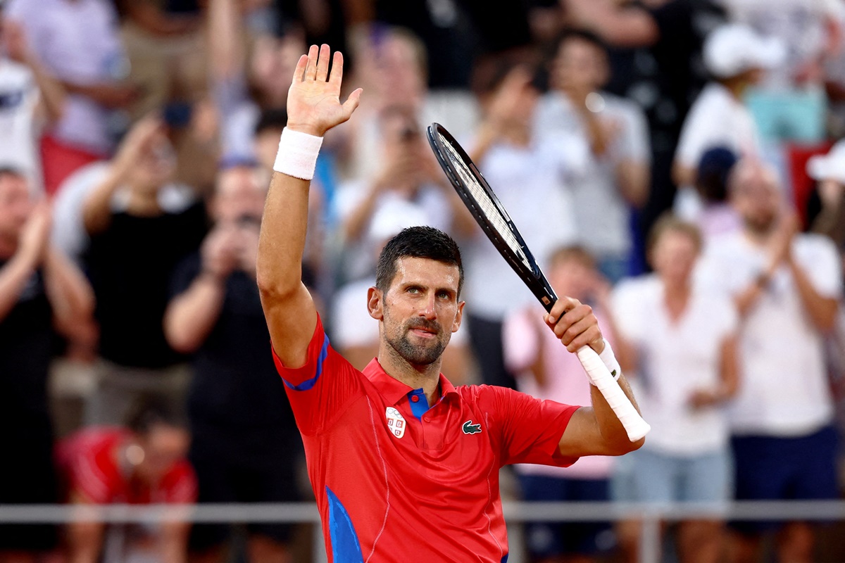 Serbia's Novak Djokovic celebrates after winning his match against Greece's Stefanos Tsitsipas.