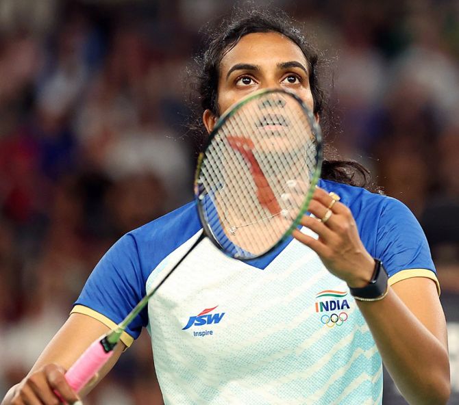 India's P V Sindhu in action during the Olympics women’s singles Round of 16 match against China's He Bing Jiao in Paris on Thursday.