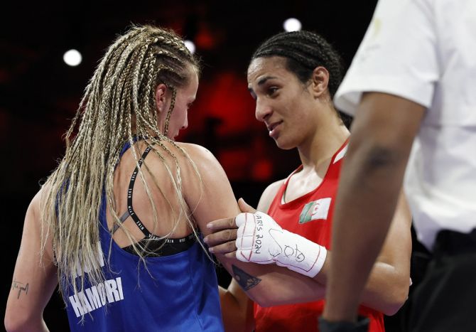 Imane Khelif and Anna Luca Hamori speak in the ring after their fight.