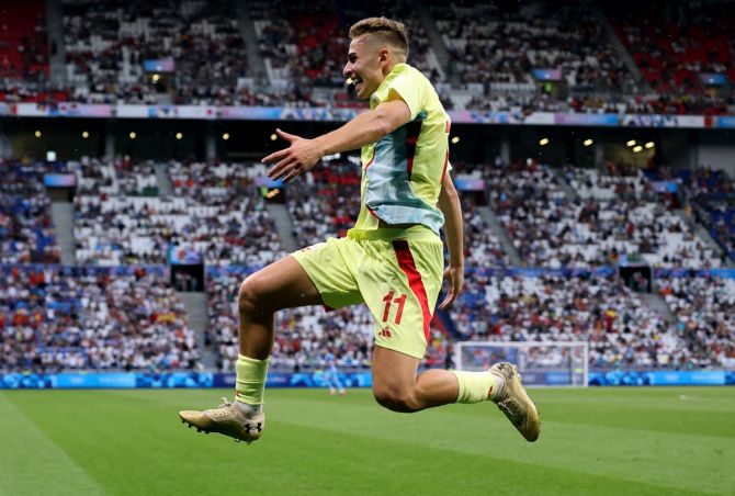 Fermin Lopez breaks into celebration after scoring Spain's second goal against Japan at Lyon Stadium, Decines-Charpieu, France.