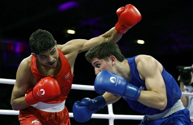 India's Nishant Dev in action with Mexico's Marco Alonso Verde Alvarez during the Olympics men's 71kg boxing quarter-final at North Paris Arena, Villepinte, France, on Saturday.