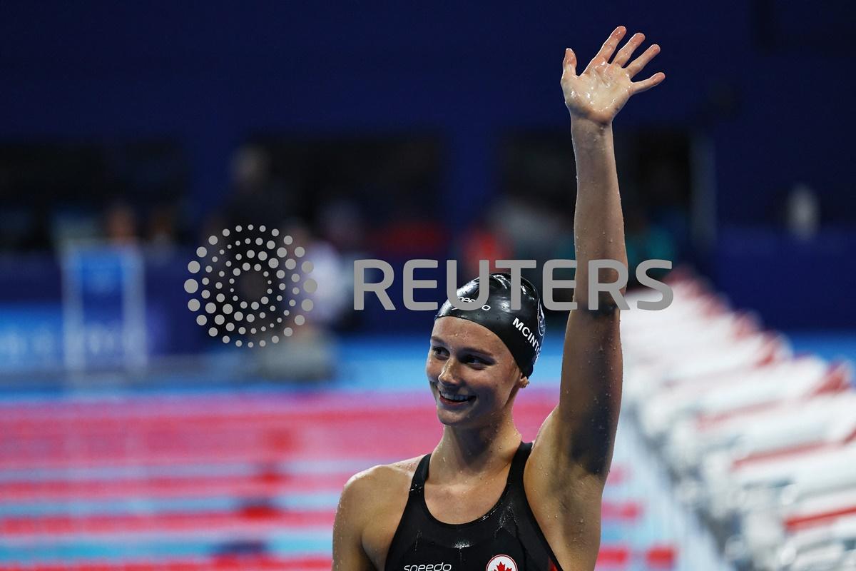 Canada's Summer McIntosh celebrates establishing a new Olympics record and winning the women's 200m Individual Medley final at Paris La Defense Arena, Nanterre, France, on Saturday.