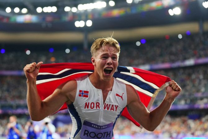 Norway's Markus Rooth celebrates after winning the gold medal in the men's decathlon.