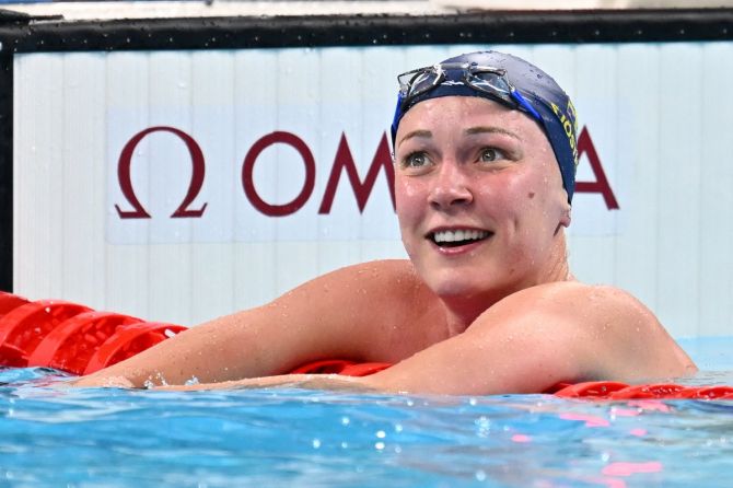 Sweden's Sarah Sjostrom reacts after realising that she had set an Olympic record in the women's 50 metres freestyle semi-finals.