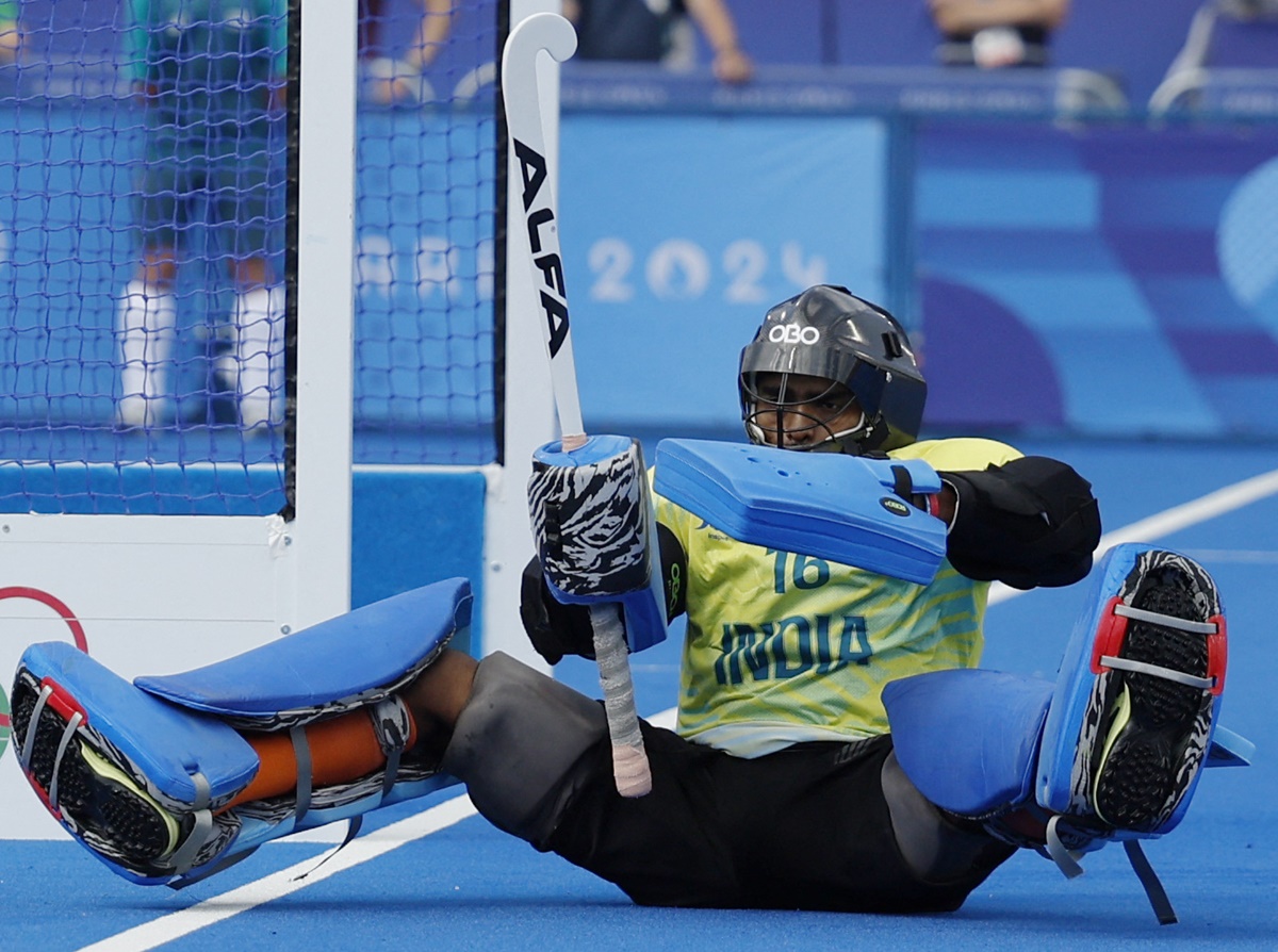 P R Sreejesh makes a save during the penalty shootout against Great Britain