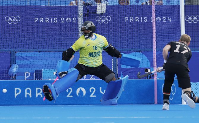 Christopher Ruehr scores a penalty stroke goal to put Germany 2-1 up.