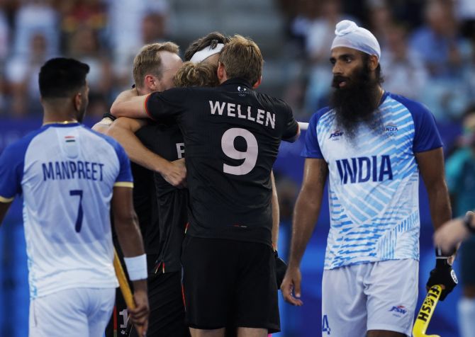 Marco Miltkau and Niklas Wellen celebrate after Gremany's winning goal in the Olympics men's hockey semi-final against India in Paris on Tuesday. 