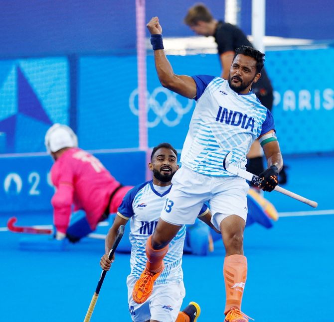 Harmanpreet Singh celebrates putting India ahead in the match. 