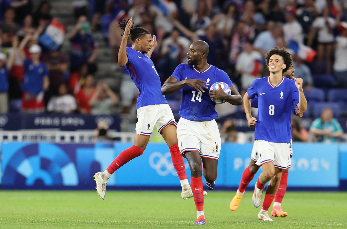 Jean-Philippe Mateta celebrates drawing France level.