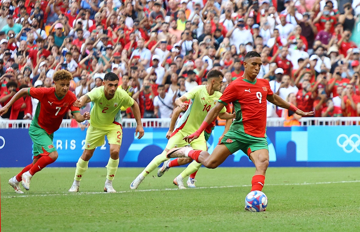Soufiane Rahimi scores from the penalty spot to put Morocco ahead in the match.