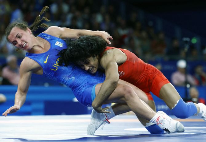 Vinesh Phogat in action with Oksana Livach of Ukraine.