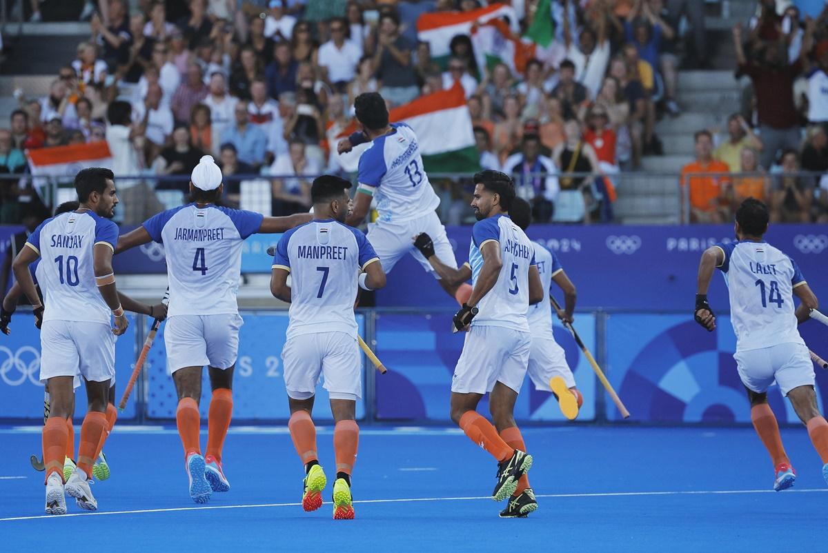 India's players celebrate after Harmanpreet Singh puts the team ahead from a penalty-corner in the Olympics men's hockey semi-final against Germany at Yves-du-Manoir Stadium, Paris, on Tuesday.