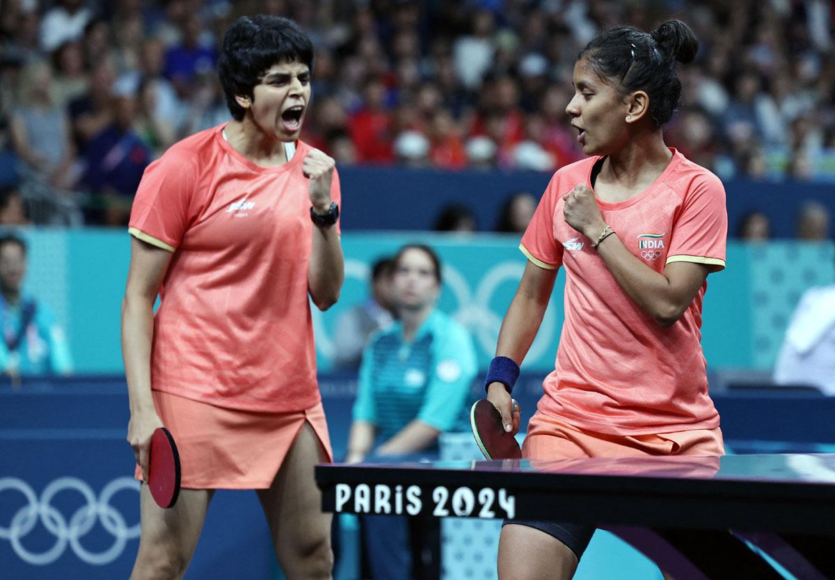 India's Sreeja Akula and Archana Girish Kamath  react during their quarter-final match against Germany's Yuan Wan and Xiaona Shan