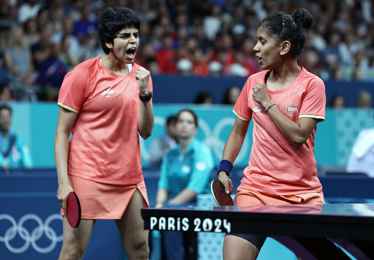 India's Sreeja Akula and Archana Girish Kamath  react during their quarter-final match against Germany's Yuan Wan and Xiaona Shan