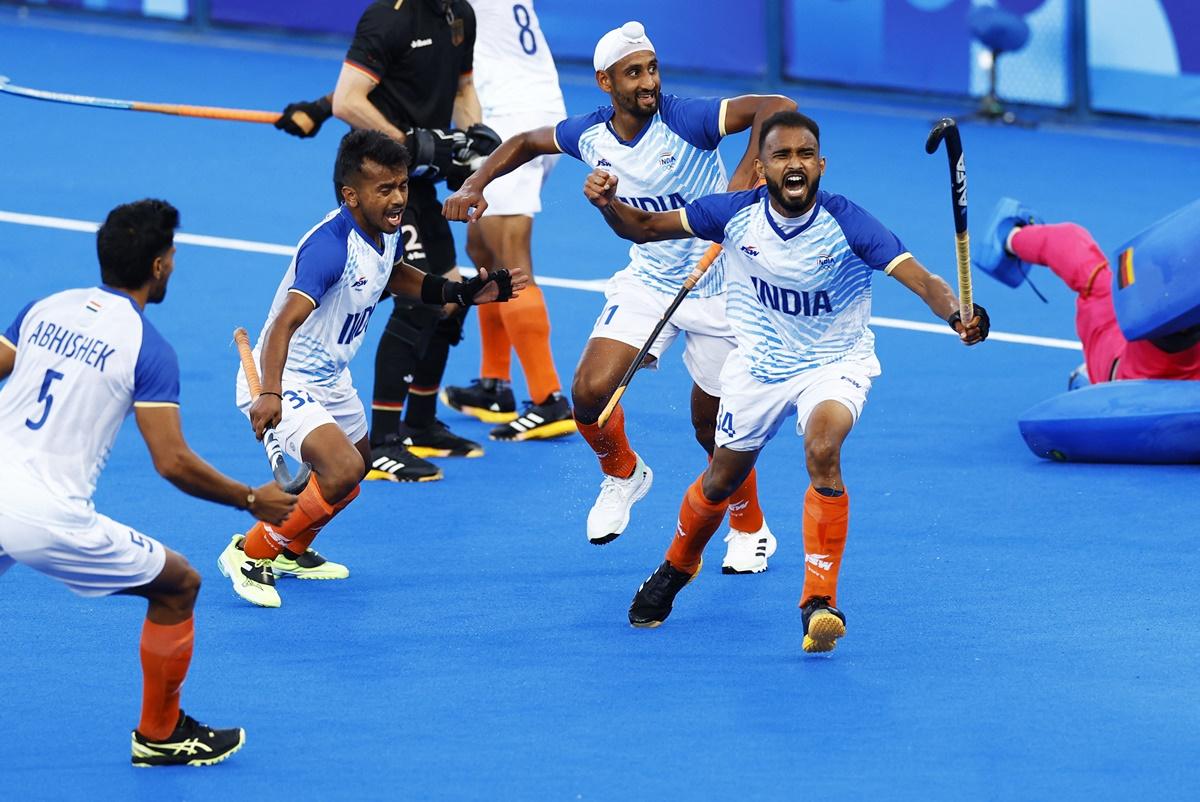 Sukhjeet Singh, Abhishek, Mandeep Singh and Vivek Sagar Prasad celebrate India's second goal.