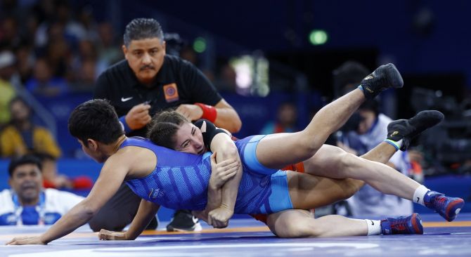 India's Antim Panghal in action during her Olympics 53kg women's Freestyle wrestling bout against Turkey's Zeynep Yetgil at the Champ de Mars Arena, Paris, on Wednesday.