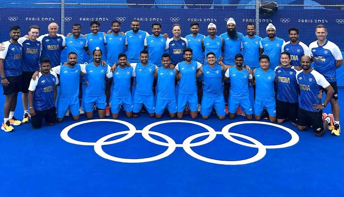 India's Olympics men's hockey bronze medal-winning team with coach Craig Fulton and support staff 