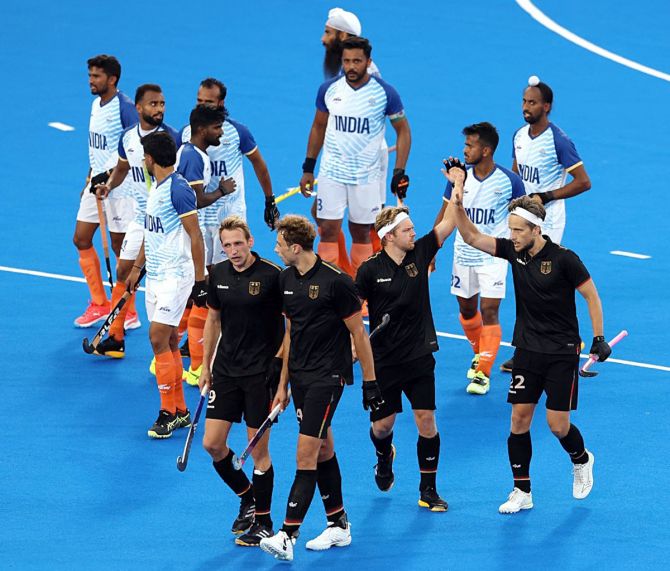 India’s players walk off the field after losing to Germany in the Olympics men’s hockey semi-finals in Paris on Tuesday.