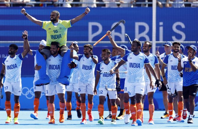 India’s Raj Kumar Pal, Manpreet Singh, Harmanpreet Singh and P R Sreejesh celebrate after victory over Spain in the Olympics men's hockey bronze medal play-off at the Yves-du-Manoir Stadium, Colombeson, Paris, on Thursday.