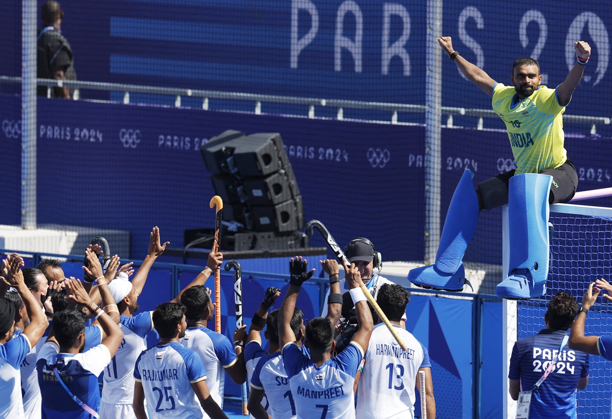 Goalkeeper P R Sreejesh, who will retire after the Games, gets a standing ovation from his India teammates.