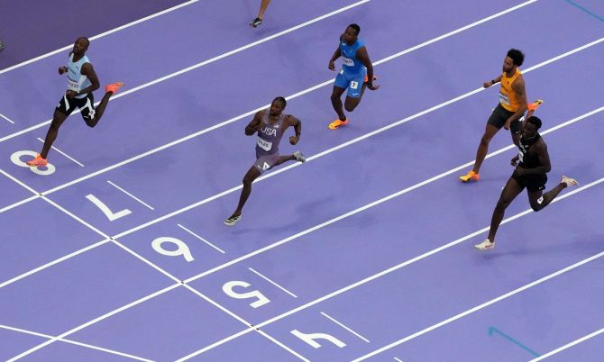 Botswana's Letsile Tebogo finishes first in semi-final 2 of the Olympics men's 200 metres, followed by Noah Lyles of United States in second place.