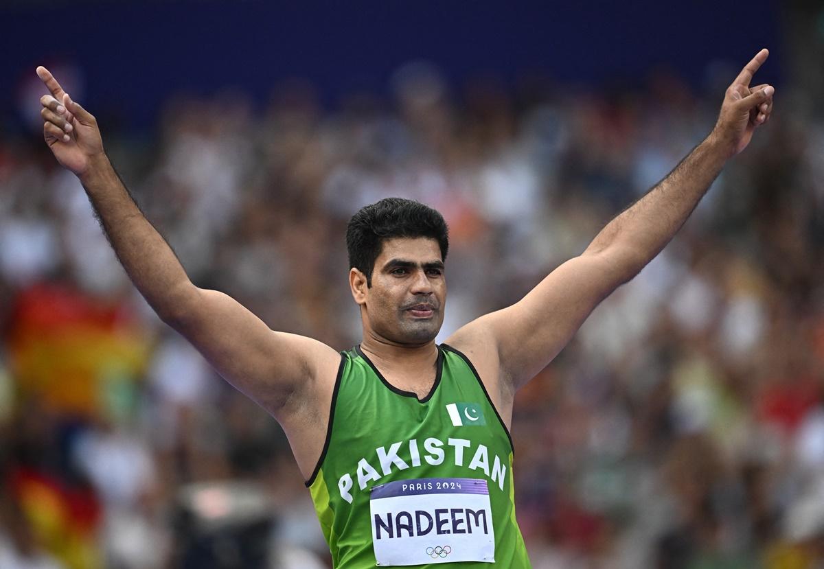 Arshad Nadeem celebrates after his Games record of 92.97m