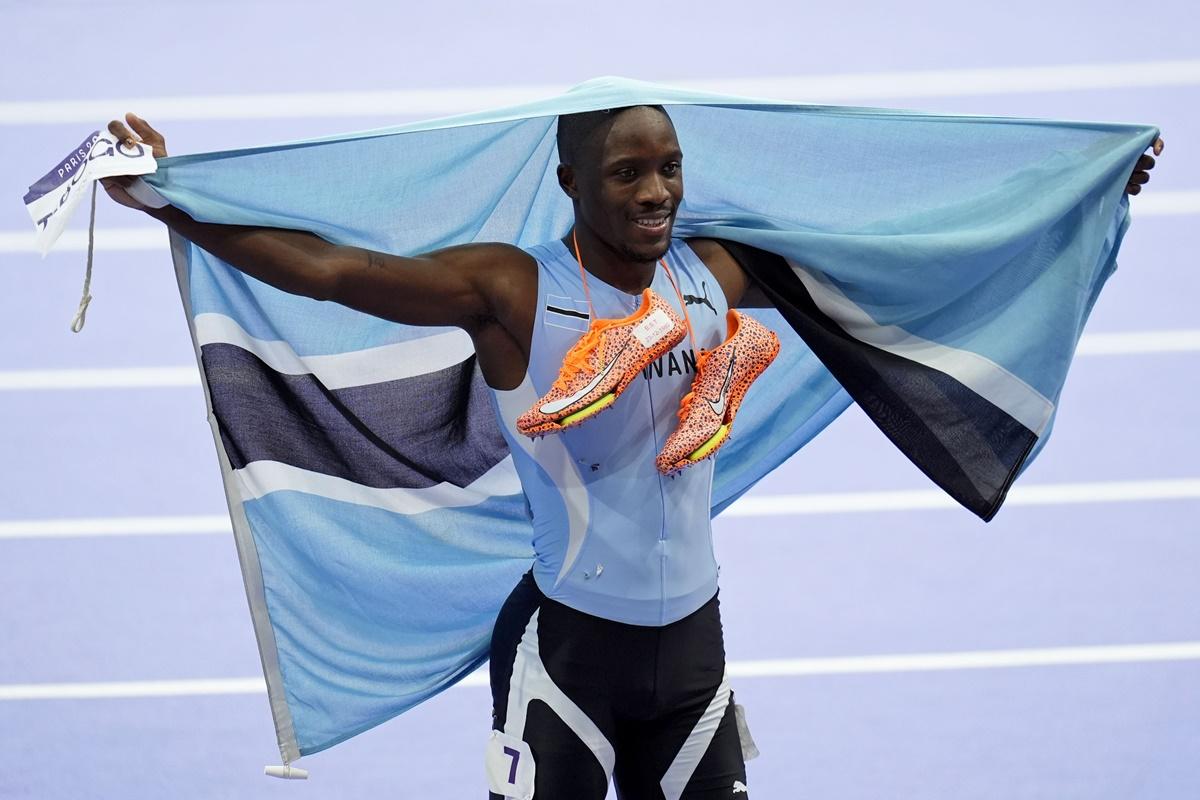 Botswana's Letsile Tebogo celebrates after winning the Olympics men’s 200m final at Stade de France, Paris, on Thursday.