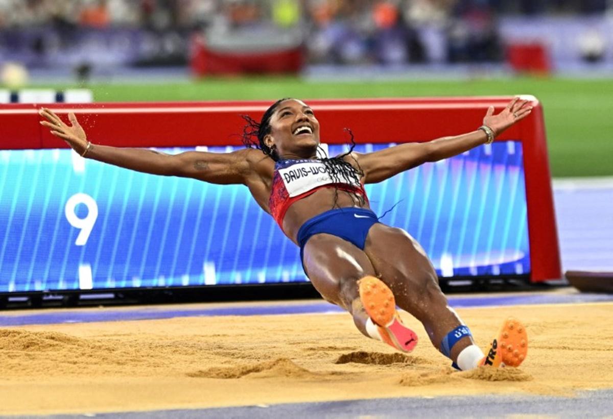 Tara Davis-Woodhall of United States celebrates after winning gold in the women's Long Jump.