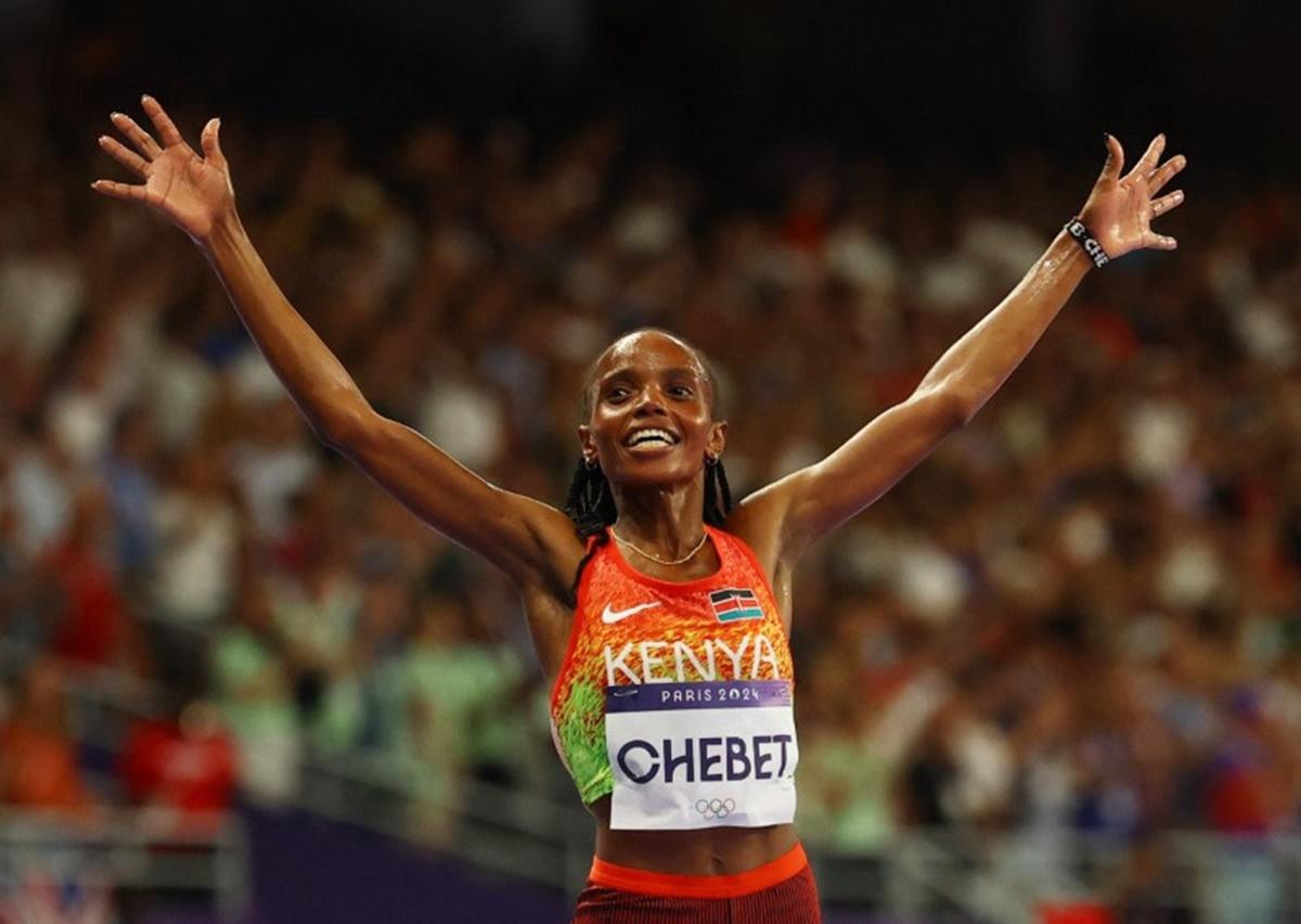 Kenya's Beatrice Chebet celebrates finishing first in the women's 10,000m final