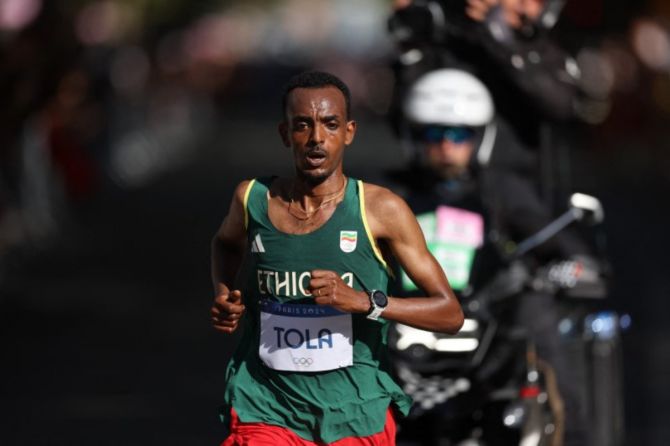 Tamirat Tola became the first Ethiopian winner of the Olympic men's marathon in 24 years.