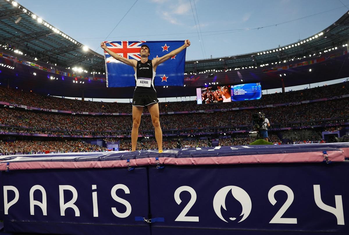 New Zealand's Hamish Kerr celebrates winning the Olympics men's High Jump final at Stade de France, Paris, on Saturday.