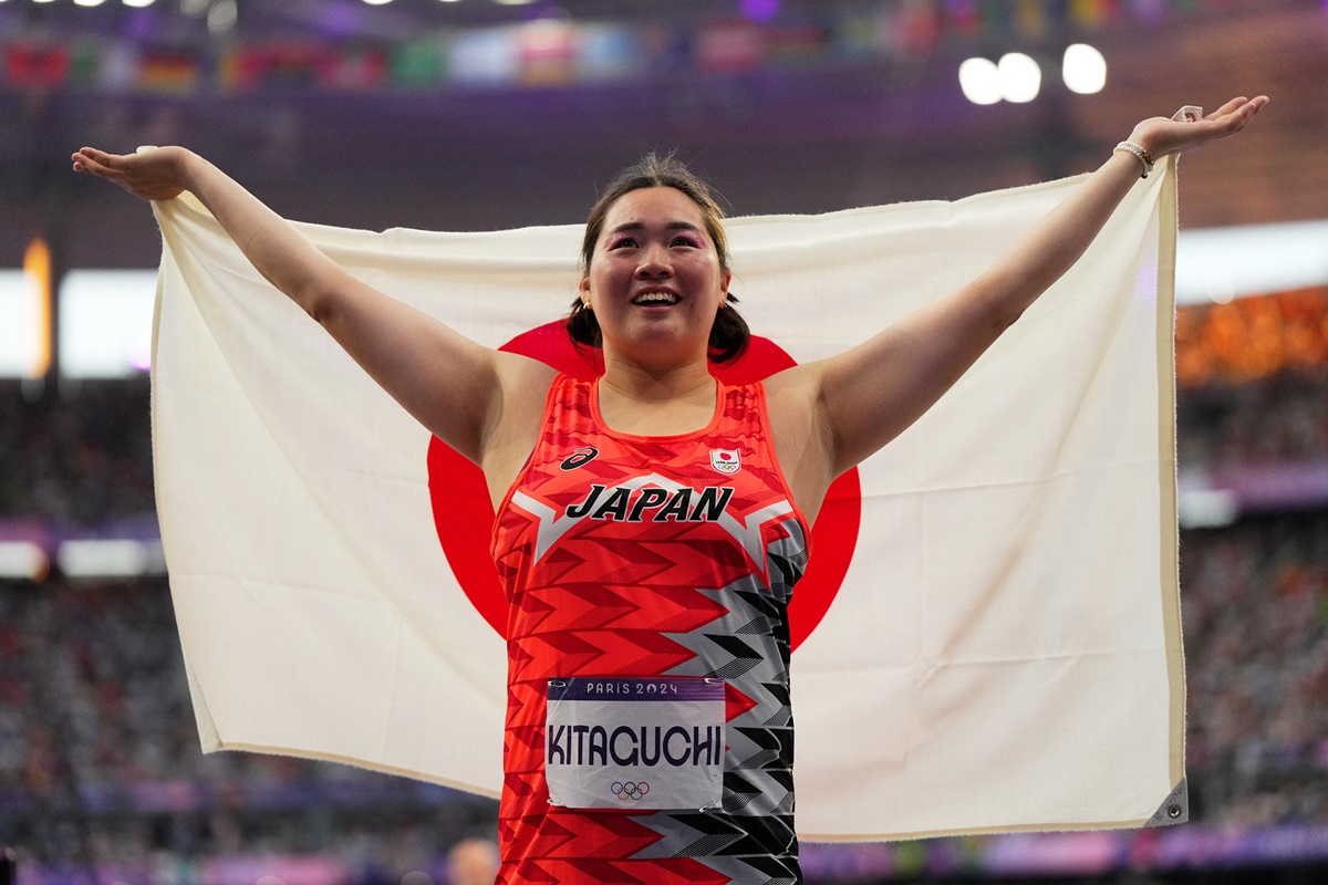 Japan's Haruka Kitaguchi celebrates winning the women's Javelin Throw final.