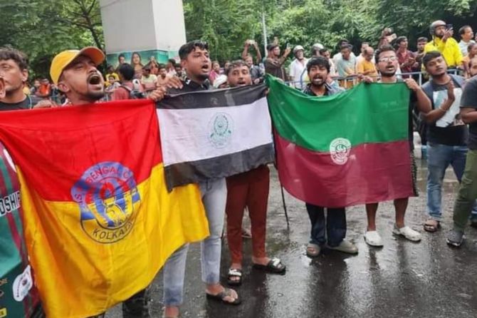 East Bengal and Mohun Bagan supporters protest the rape and murder of the doctor from Kolkata, outside Salt Lake Stadium on Sunday