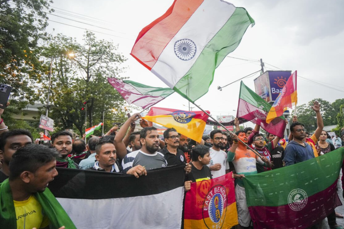 Fans protest outside the Salt Lake Stadium in Kolkata, on Sunday