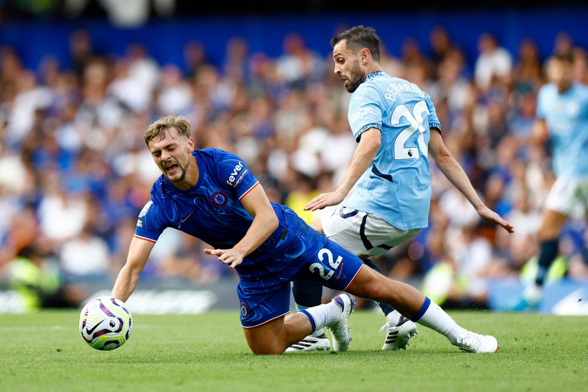 Chelsea's Kiernan Dewsbury-Hall and Manchester City's Bernardo Silva in action