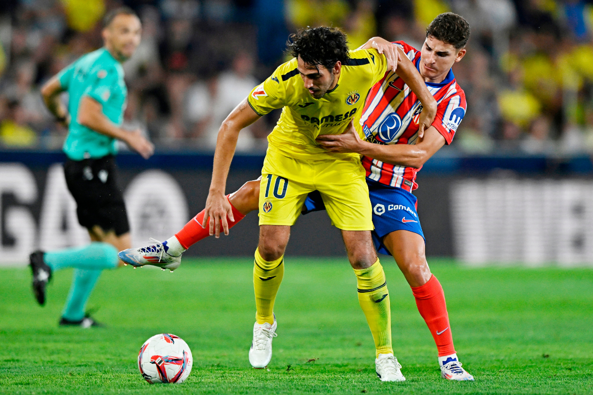 Atletico Madrid's Julian Alvarez in action with Villarreal's Dani Parejo during their La Liga match at Estadio de la Ceramica, Villarreal, on Monday