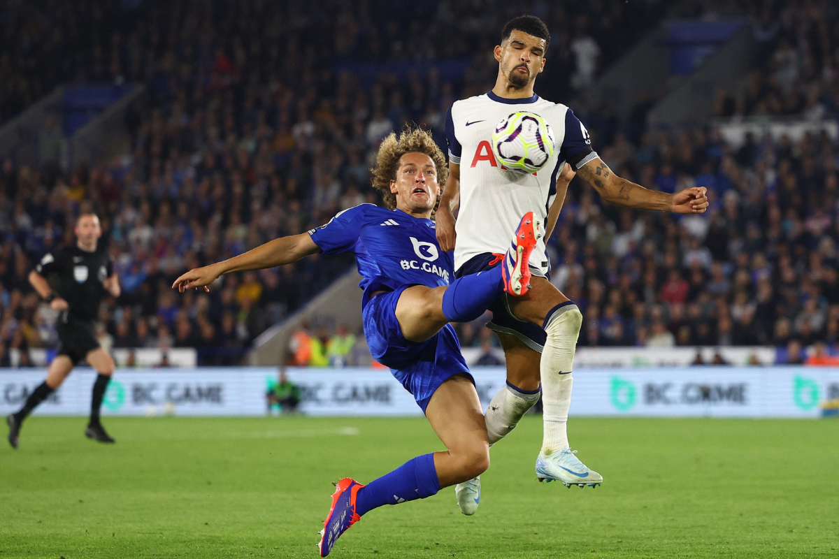 Leicester City's Wout Faes in action with Tottenham Hotspur's Dominic Solanke