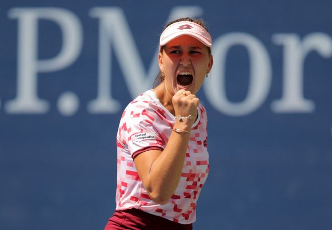 Kamilla Rakhimova reacts after breaking Iga Swiatek to get to 5-5 in the second set.