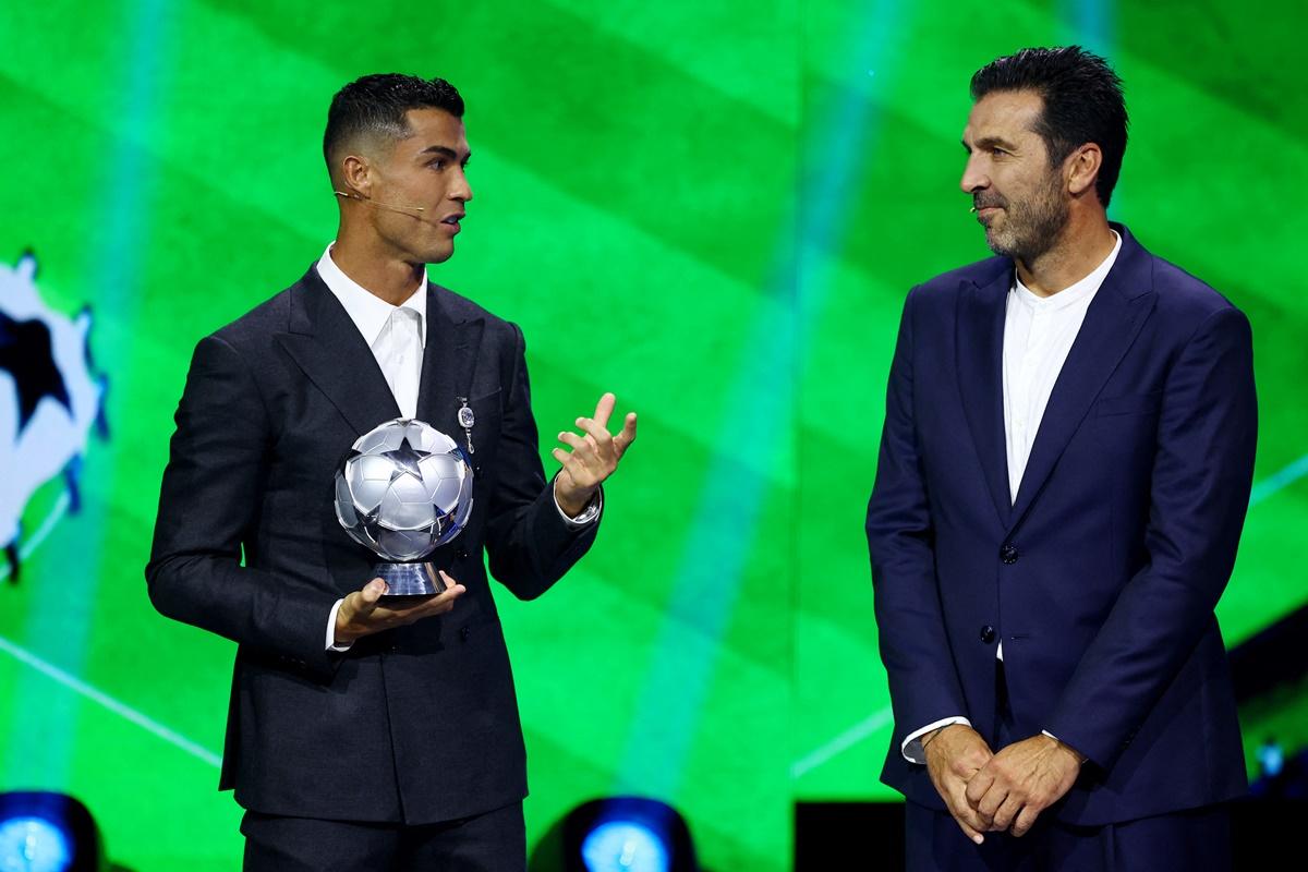 Cristiano Ronaldo and Gianluigi Buffon at the Champions League Phase Draw 2024.