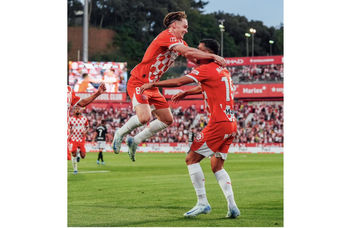 Girona players celebrate after scoring against Osasuna on Thursday