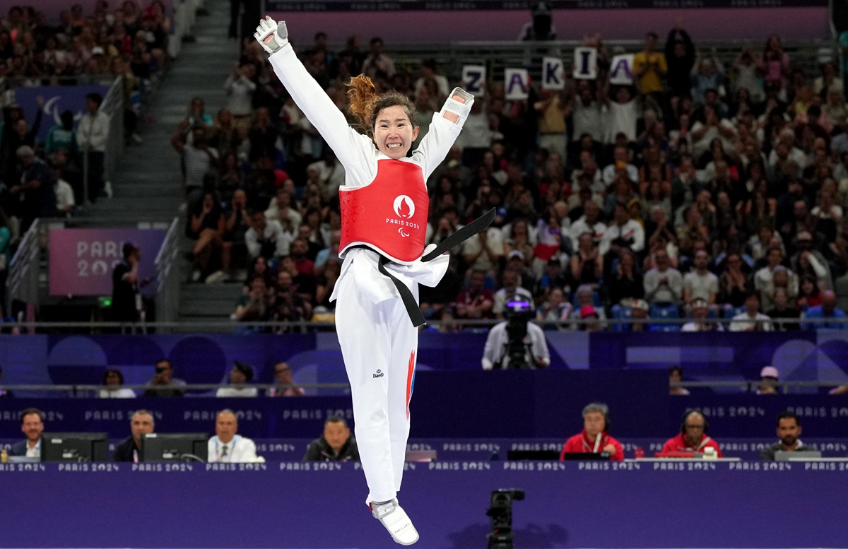 Zakia Khudadadi of Refugee Paralympic Team celebrates winning her Taekwondo women's K44-47kg Repechage fight against Turkey's Nurcihan Ekinci at Grand Palais, Paris, August 29, 2024.