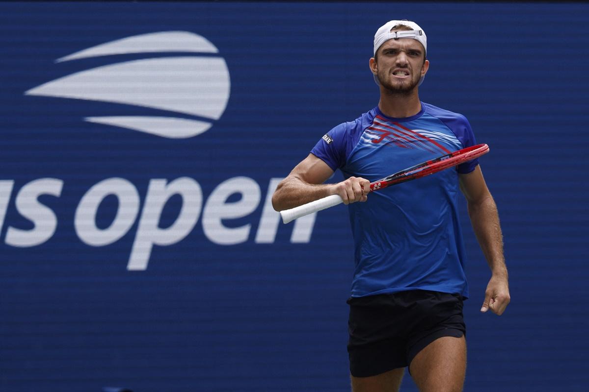 The Czech Republic's Tomas Machac celebrates getting to match-point against Sebastian Korda of the United States.