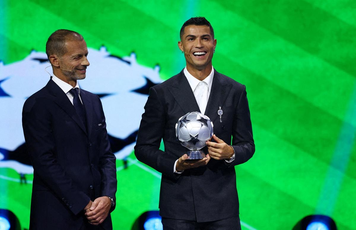 Cristiano Ronaldo poses with UEFA president Aleksander Ceferin after receiving the all-time top scorer of the Champions League award during the Champions League Phase Draw 2024 at Grimaldi Forum, Monaco, on Thursday.