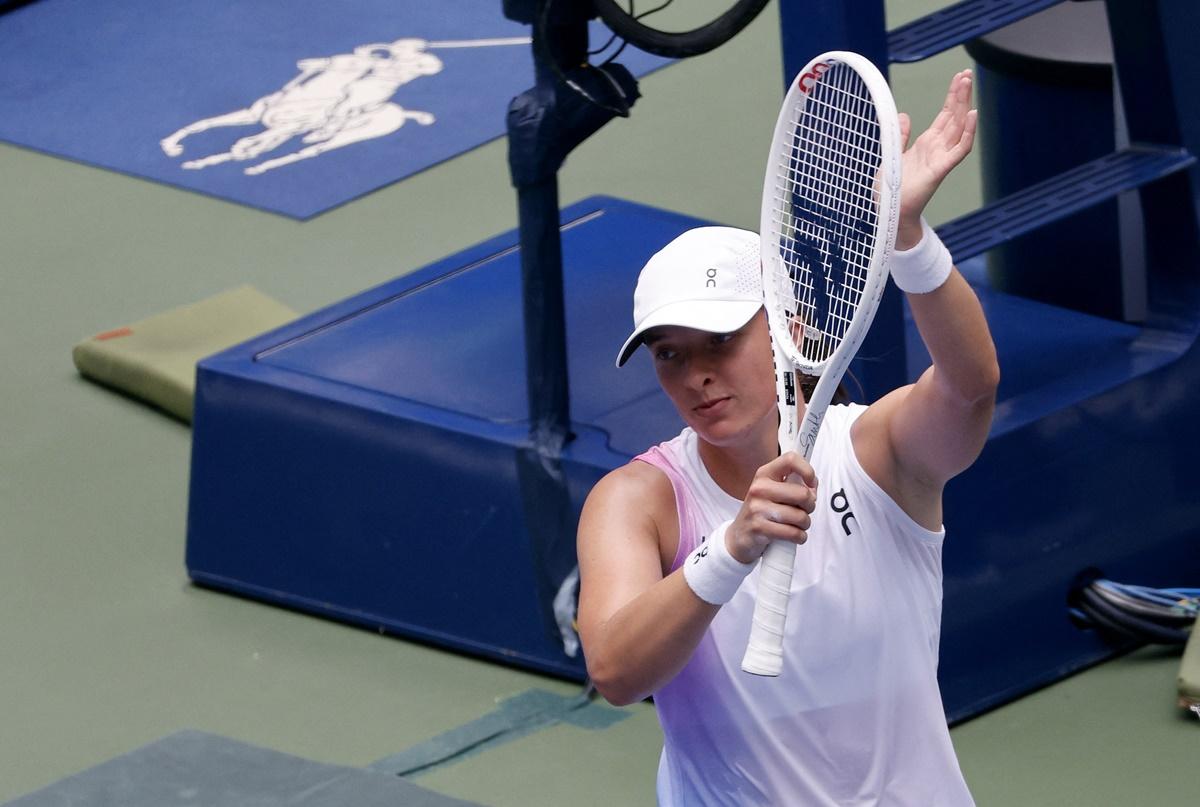 Poland's Iga Swiatek celebrates an easy victory over Japan's Ena Shibahara.