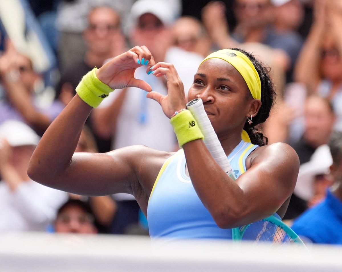 Coco Gauff gestures to the crowd after a magnificent come-from-behind victory.