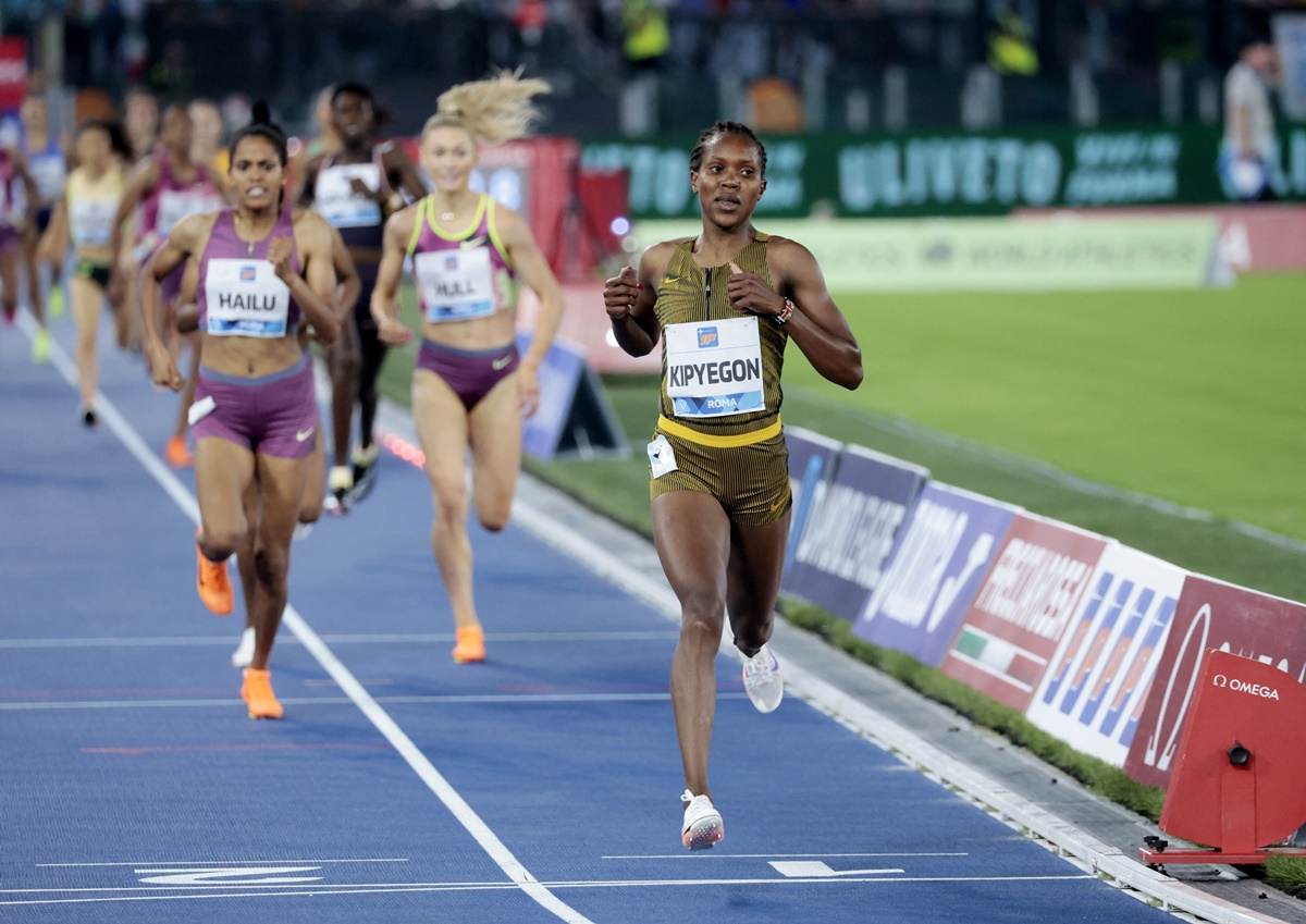 Kenya's Faith Kipyegon crosses the line to win the women's 1500 metres.